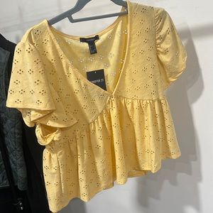 Forever 21 yellow shirt. Size large. Eyelet babydoll style.